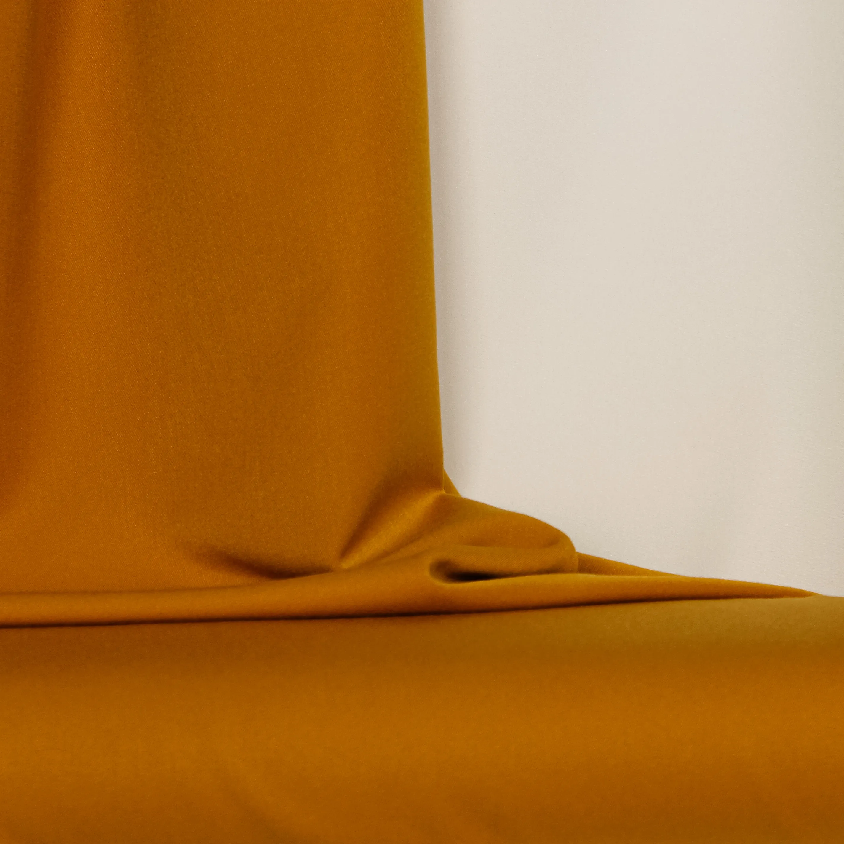 Viscose polyester tricot mengeling oker